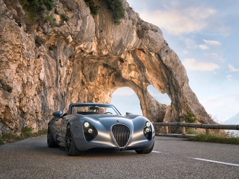 grey Weismann Project Thunderball driving on a very scenic route trough the mountain sides